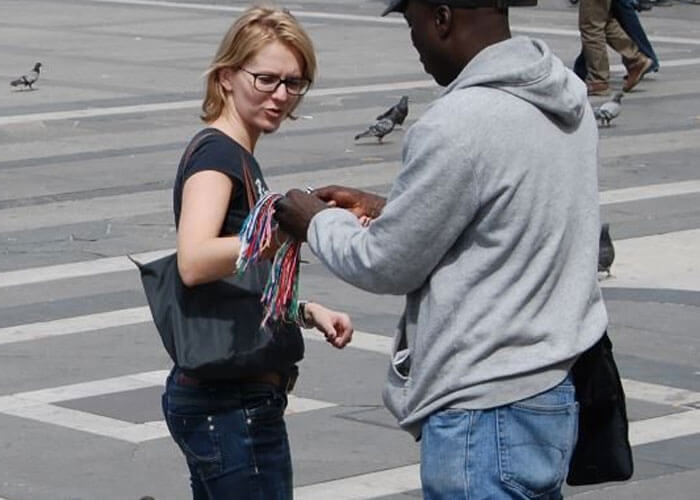 Beware of friendly vendors offering “free” bracelets or roses; once you accept, they’ll demand payment. It’s a common scam to prey on tourists’ goodwill. <br> Insider Tip: Politely decline and keep walking. Enjoy the charm of Florence without the unexpected expenses!