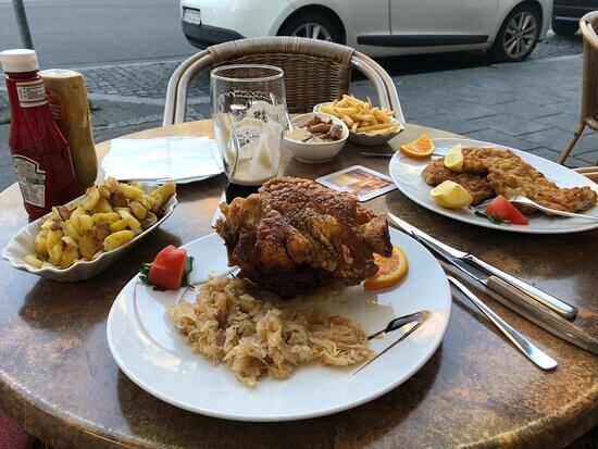 Restaurants in the immediate vicinity of Römer are typically geared towards tourists, with menus priced accordingly. For a more authentic and budget-friendly meal, venture into neighborhoods like Sachsenhausen or Nordend, where locals dine.