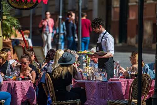 Be wary of restaurants in Old Town displaying "Tourist Menu" signs or having staff actively recruiting customers on the street. These places often serve lower quality food at inflated prices and may add hidden charges to your bill.