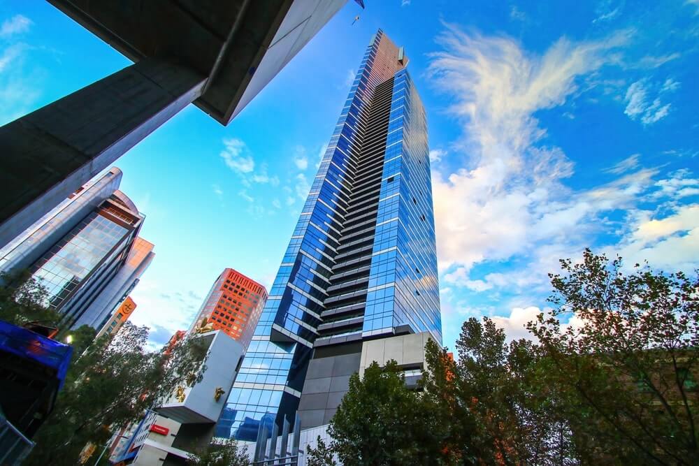 Skip the overpriced SkyDeck at Eureka Tower during peak hours when tickets cost triple; visit at sunset for better value and shorter queues, or try the Manchester Unity Building's rooftop for free views.