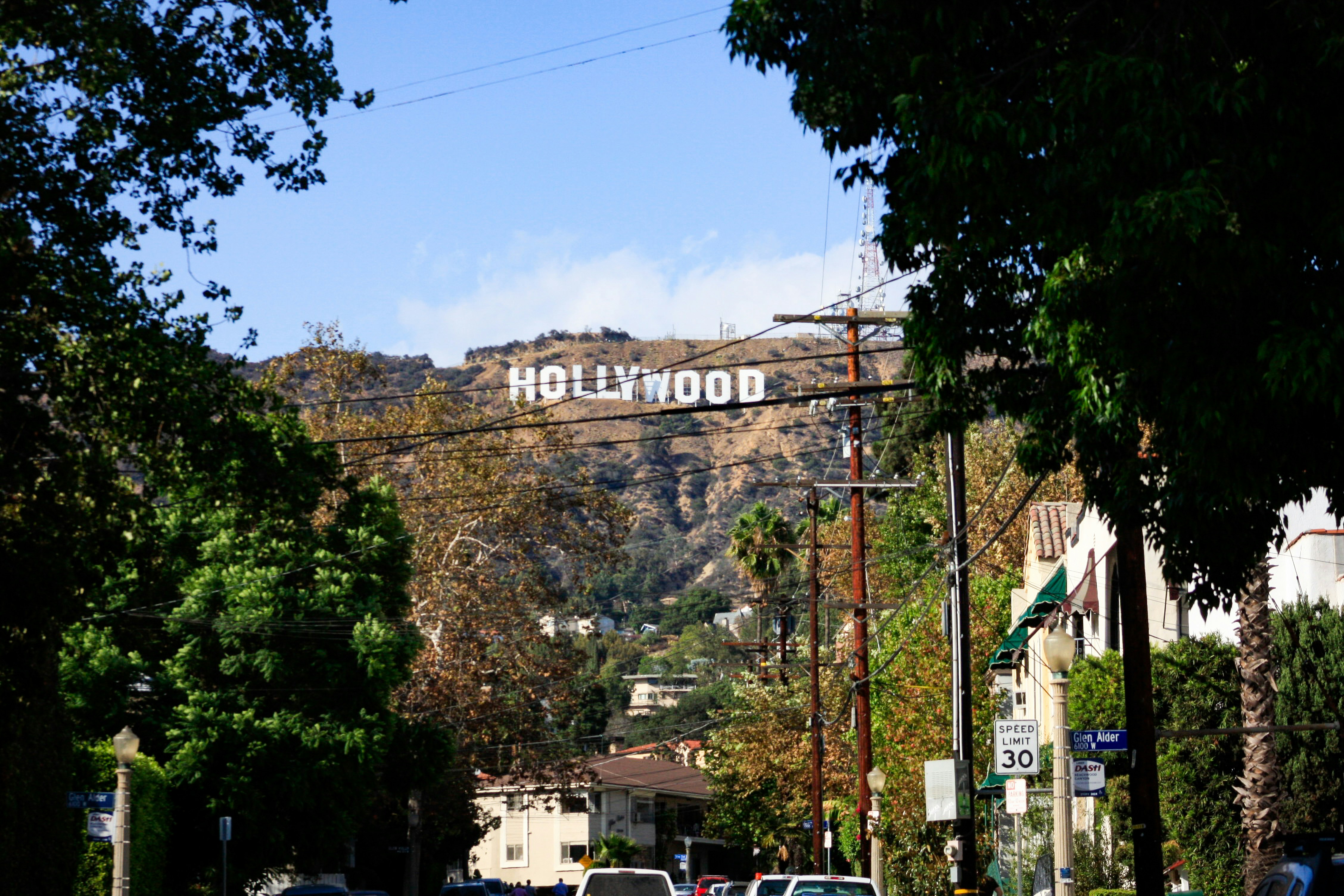 The Hollywood sign seen from a quiet residential street below
