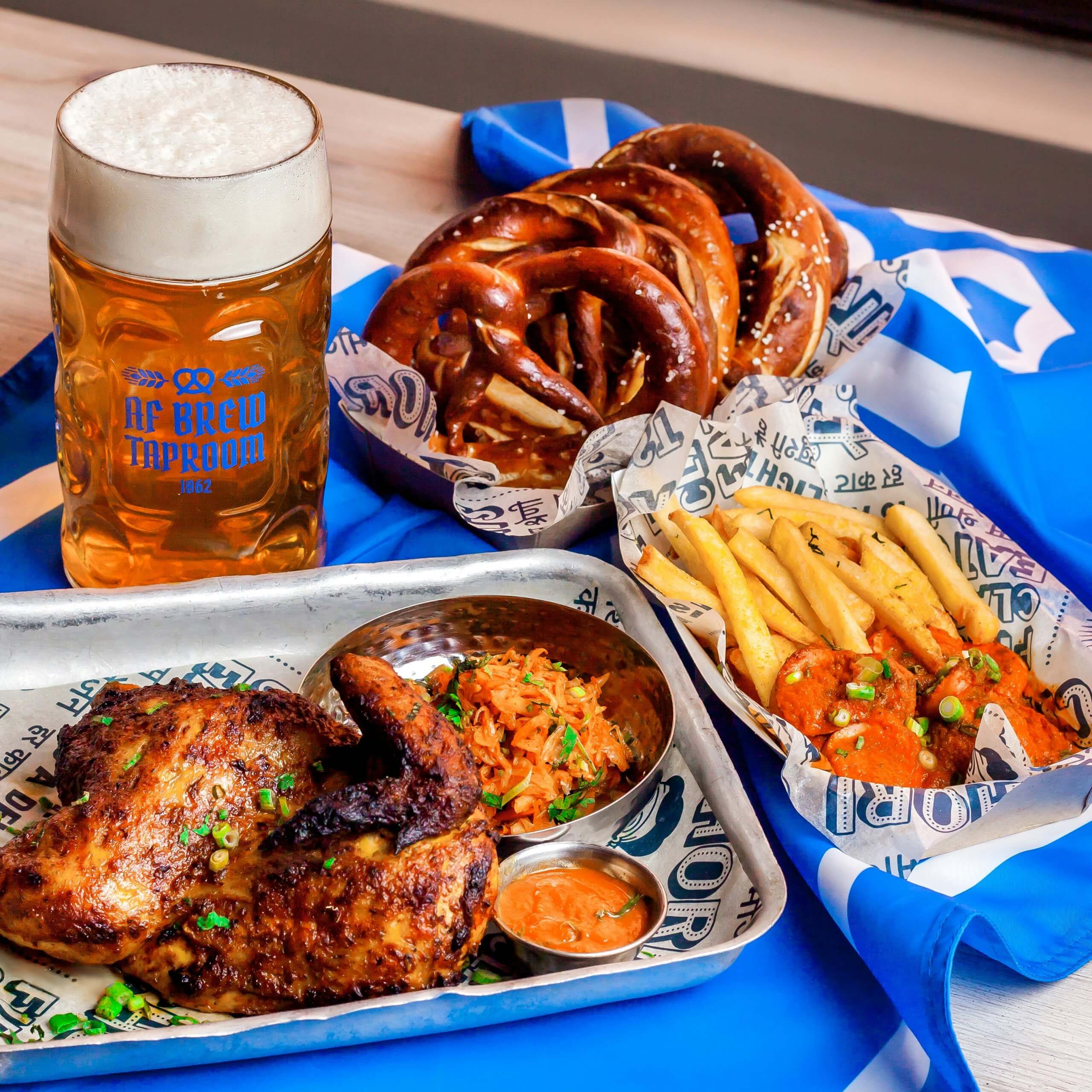 Traditional Bavarian pretzels and food spread at Oktoberfest